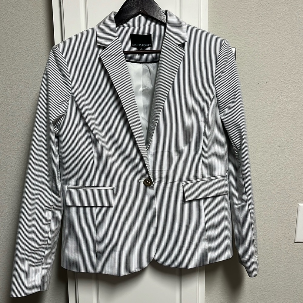 Navy and white woman’s blazer